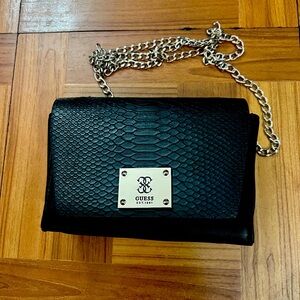 Cute GUESS crossbody bag with silver chain.  Fun going out bag!